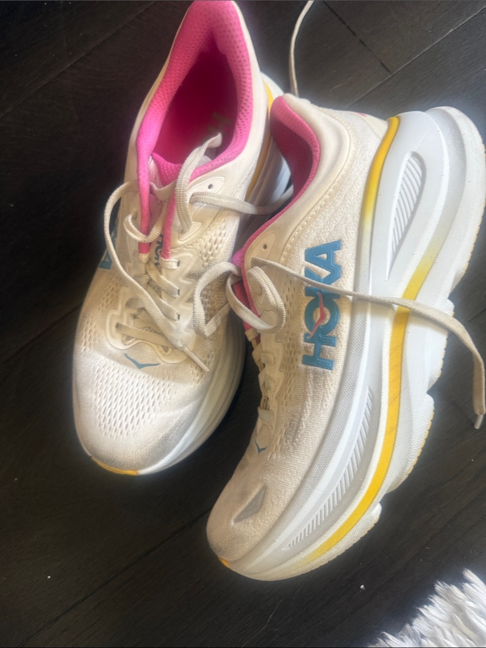 Hoka Women's White Running Shoes with Pink Liner and Yellow Trim